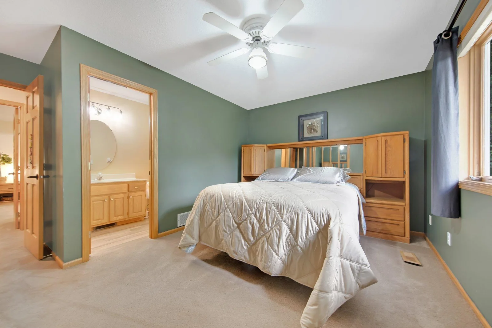 1 of 2 lower level bedrooms. Both have private 3/4 bathrooms!