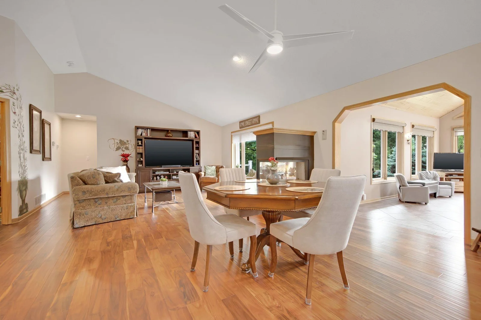 Dining room flows into the kitchen, living room, and an expansive 4 season porch!