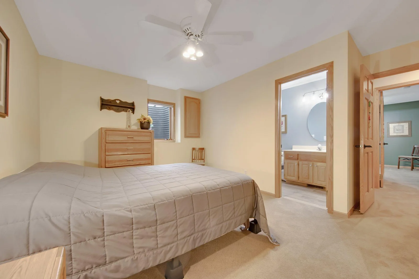 2nd lower level bedroom with private 3/4 bathroom.