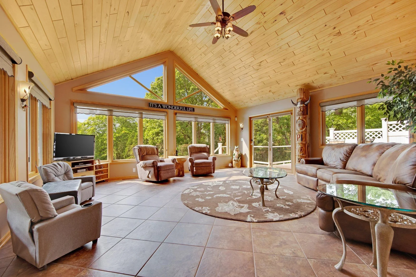 The 4 season porch was the perfect addition! Walks out to the deck and the views are perfect all year round! Forced air heat but also electric, in floor heating.
