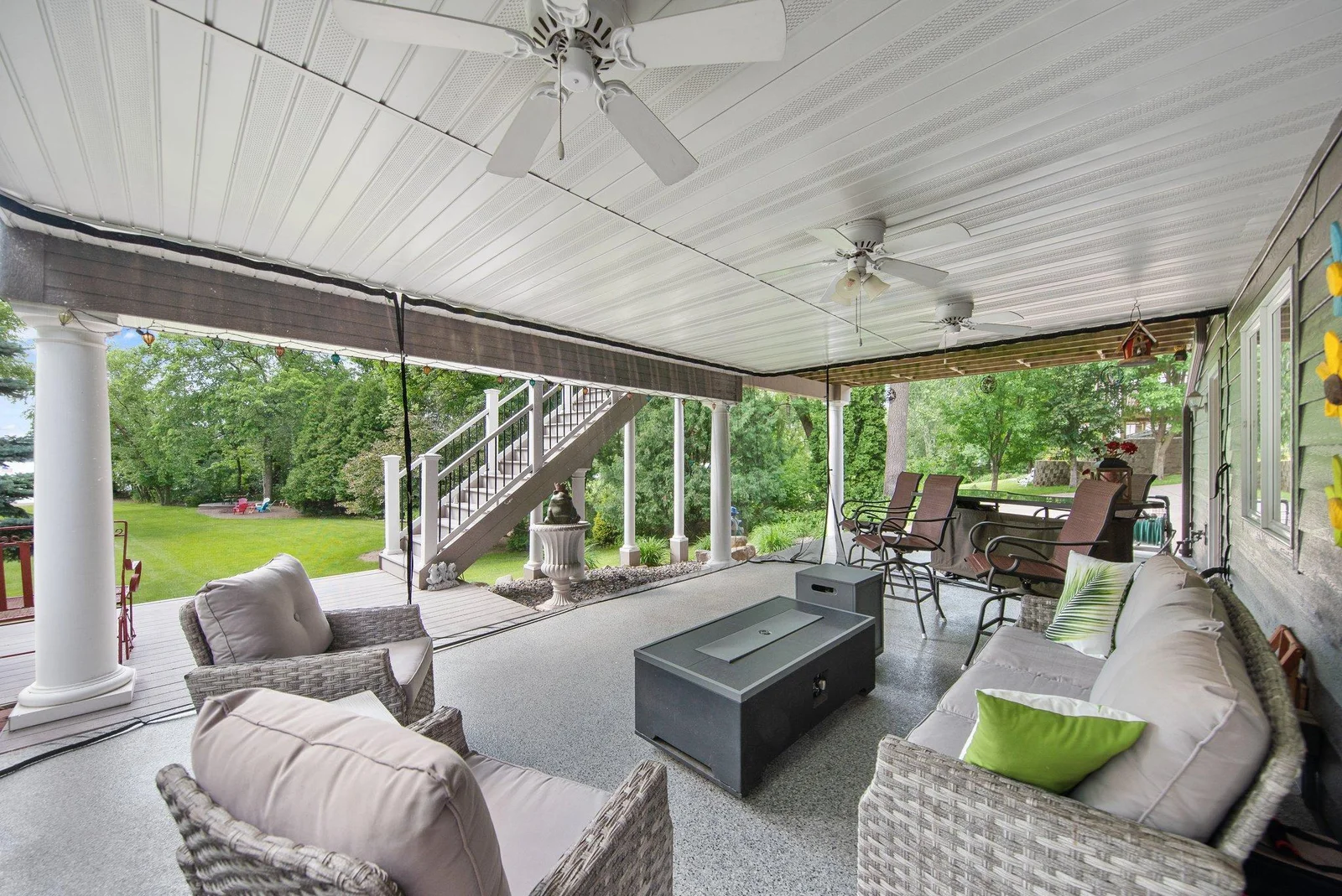 Screened in porch has a finished ceiling and epoxy concrete floor expanding your living space to enjoy the outdoors.