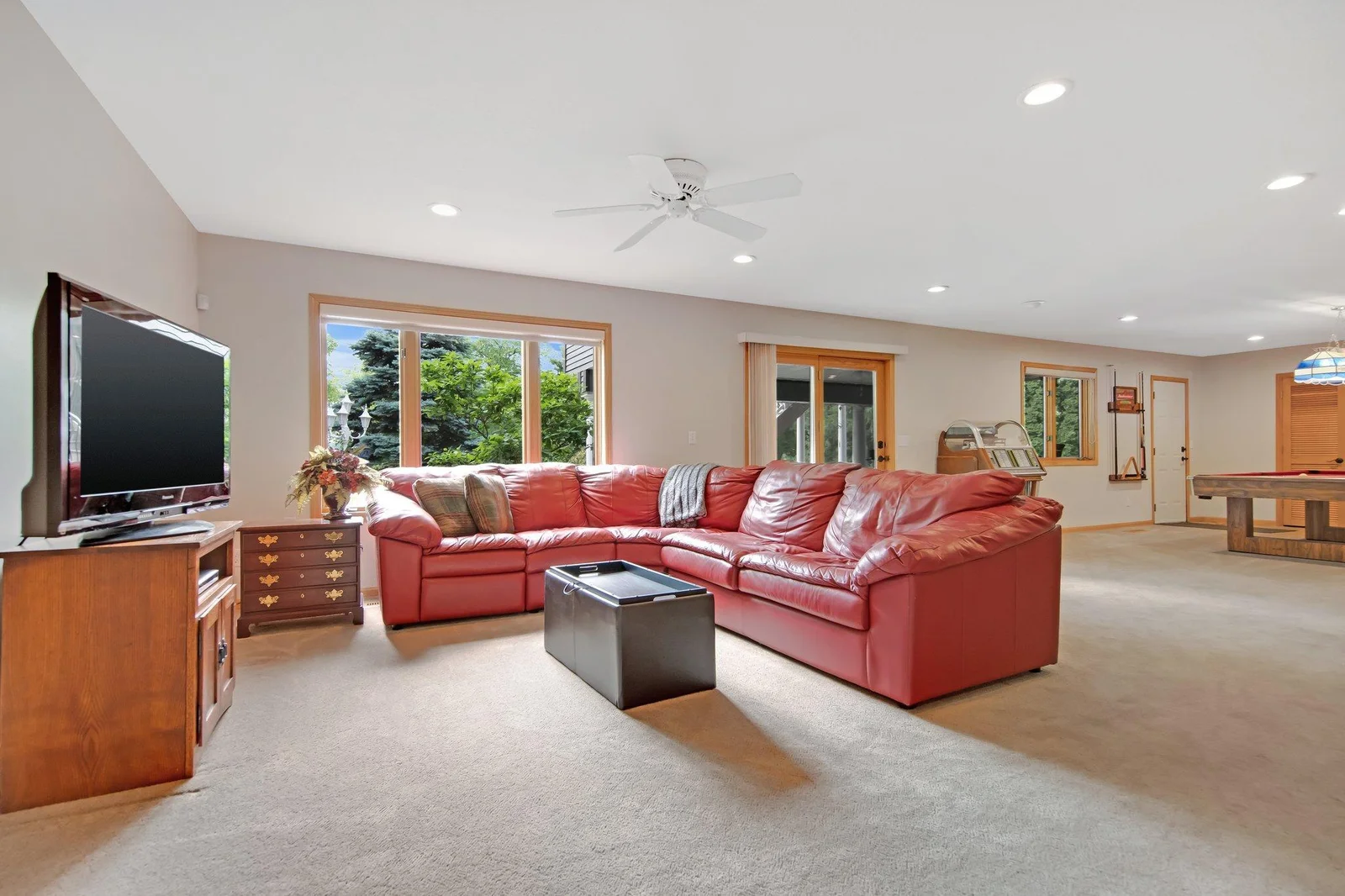 Head down to the walk-out lower level! Sliding patio door leads to the screened in porch!