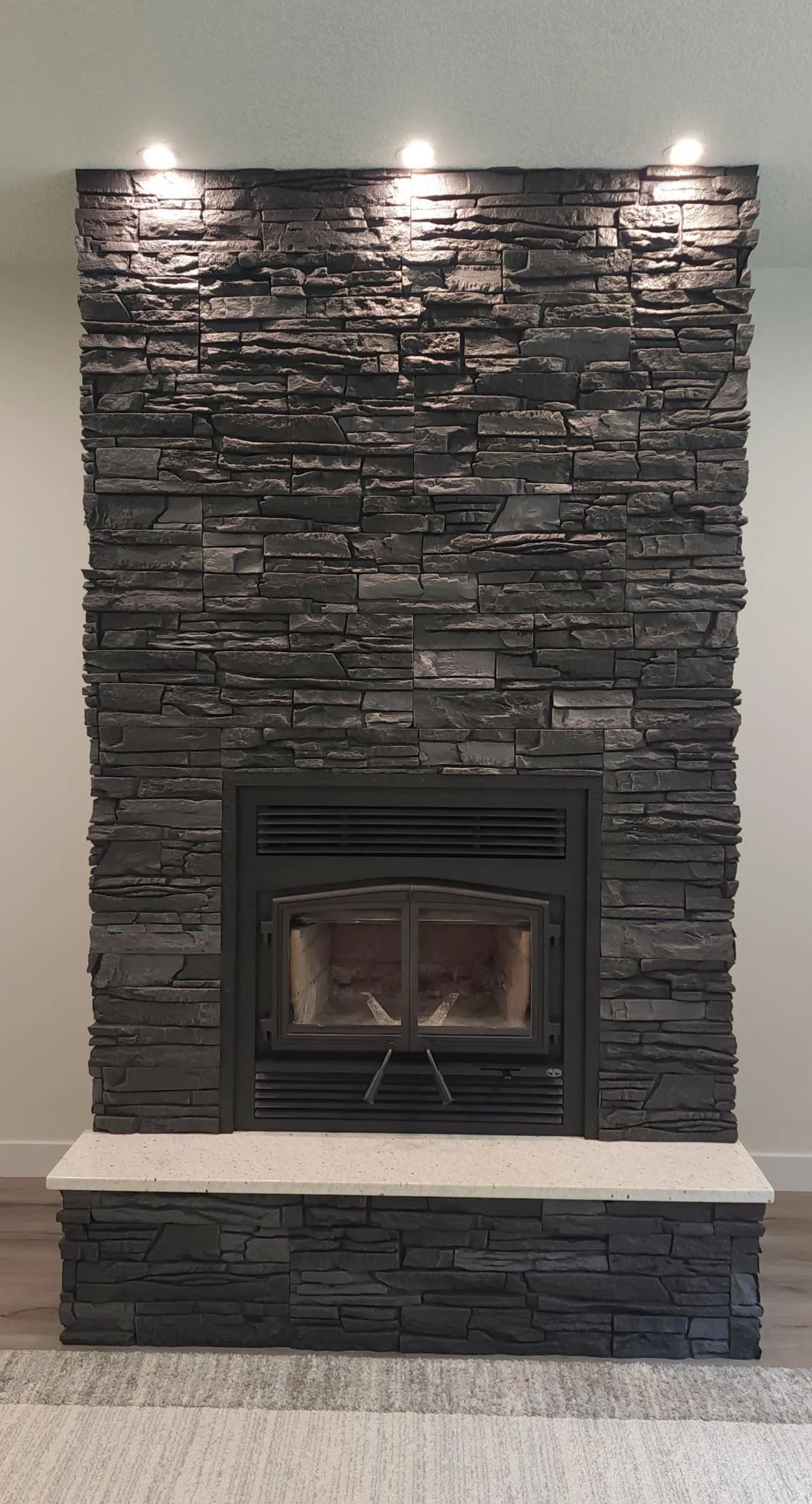 Wood burning fireplace is a beautiful focal point in the living room