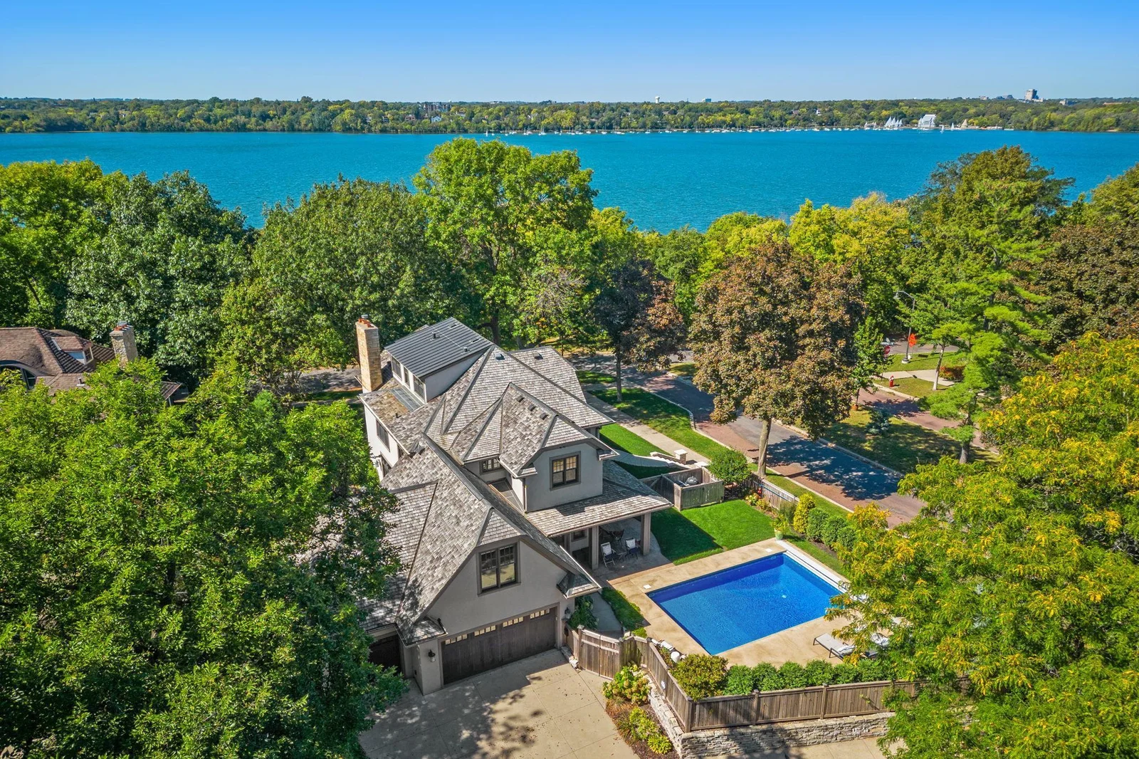 Sophisticated exterior that effortlessly complements its historic attributes, the property sure commands a stately presentation while overlooking Lake Harriet.