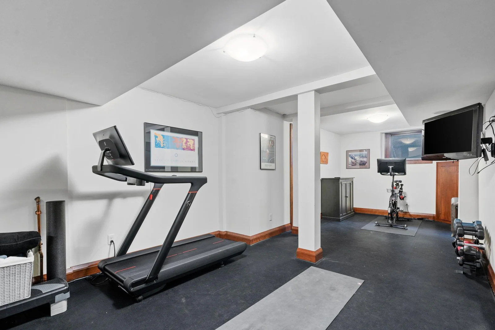 The lower level also includes a fantastic space for working out or flex space and storage.