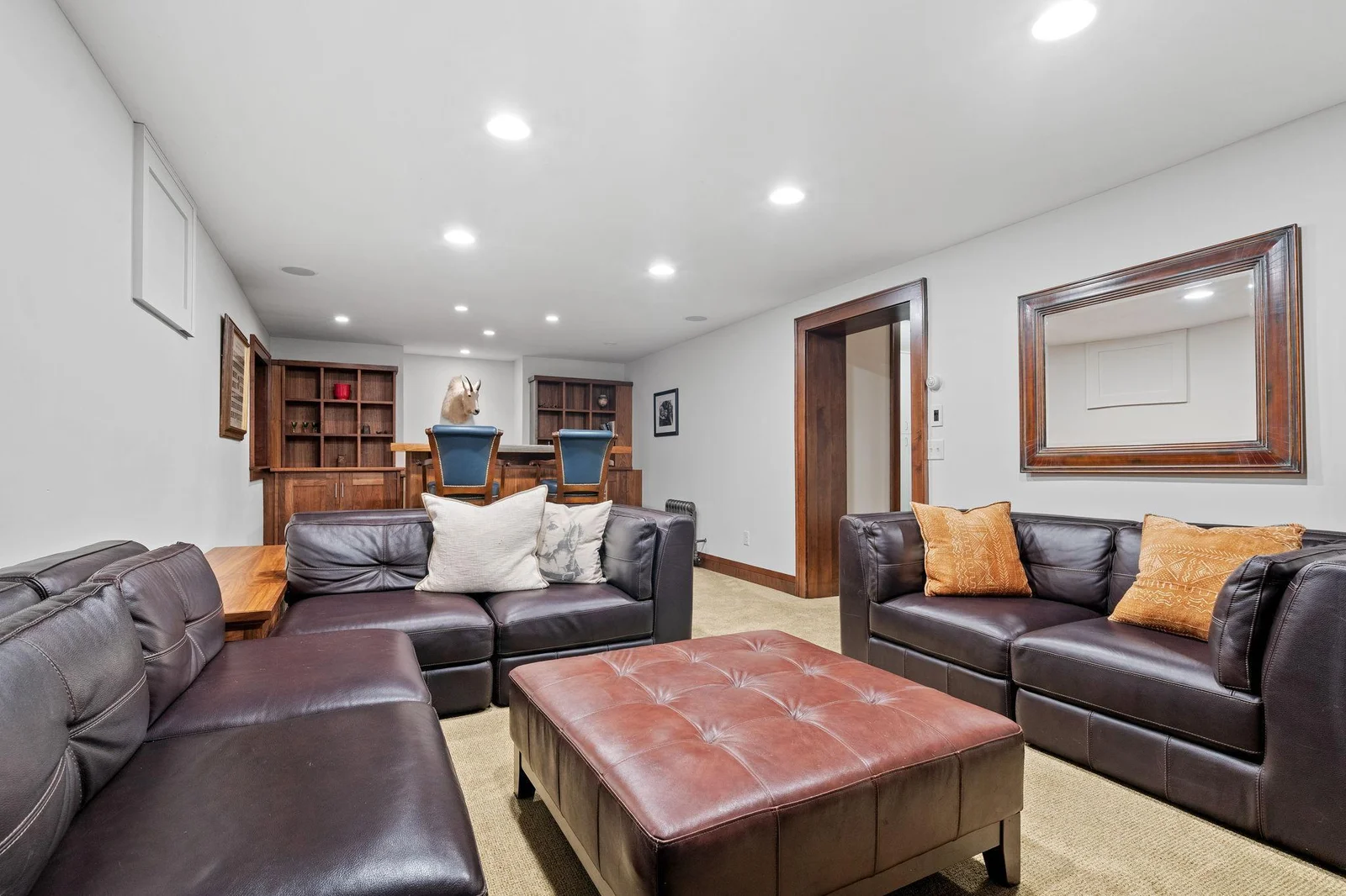 Located in the lower level you will find a great family room space with a fire place and bar.