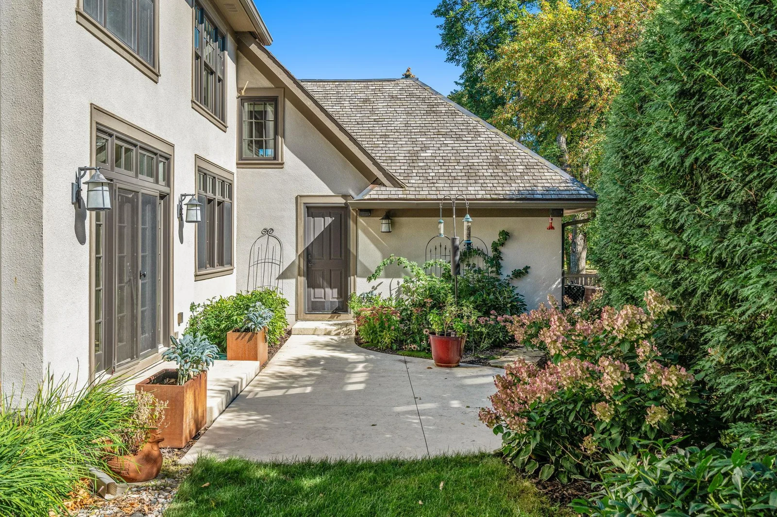 Enjoy the side patio area located right outside the kitchen living room area.