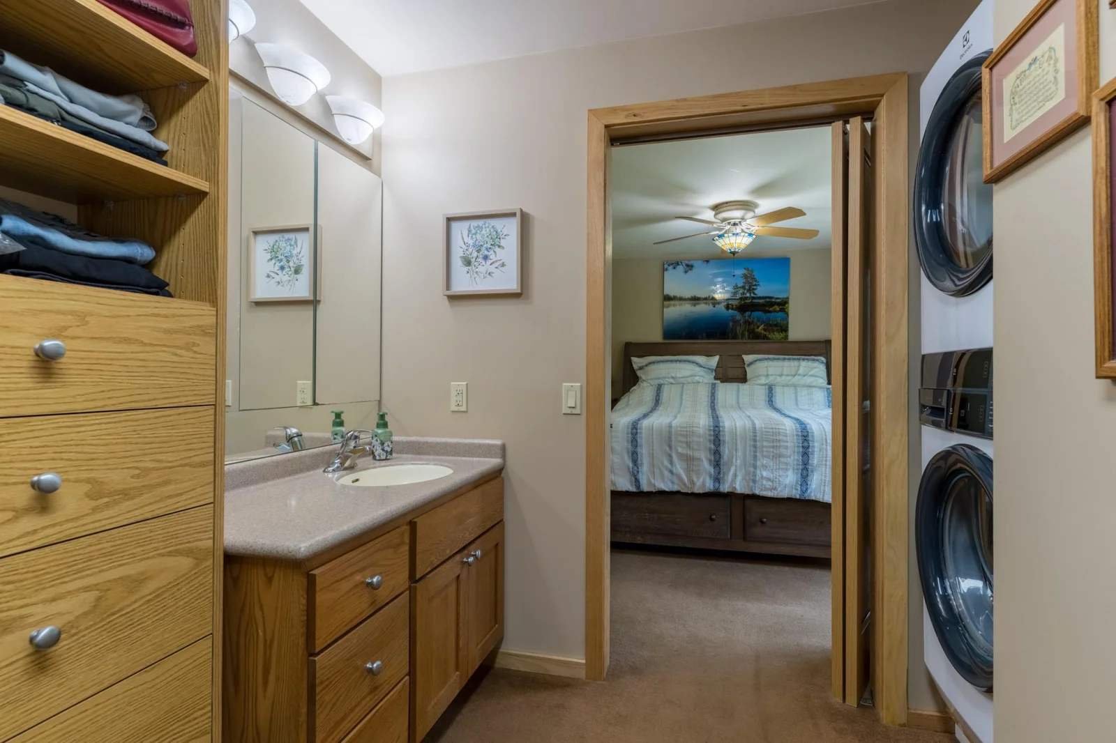 Primary Walk-In Closet with Laundry 2.jpg