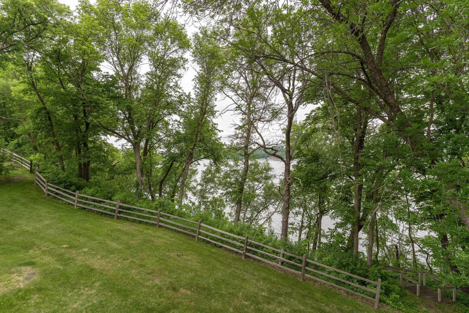 Back yard with spilt rail fence