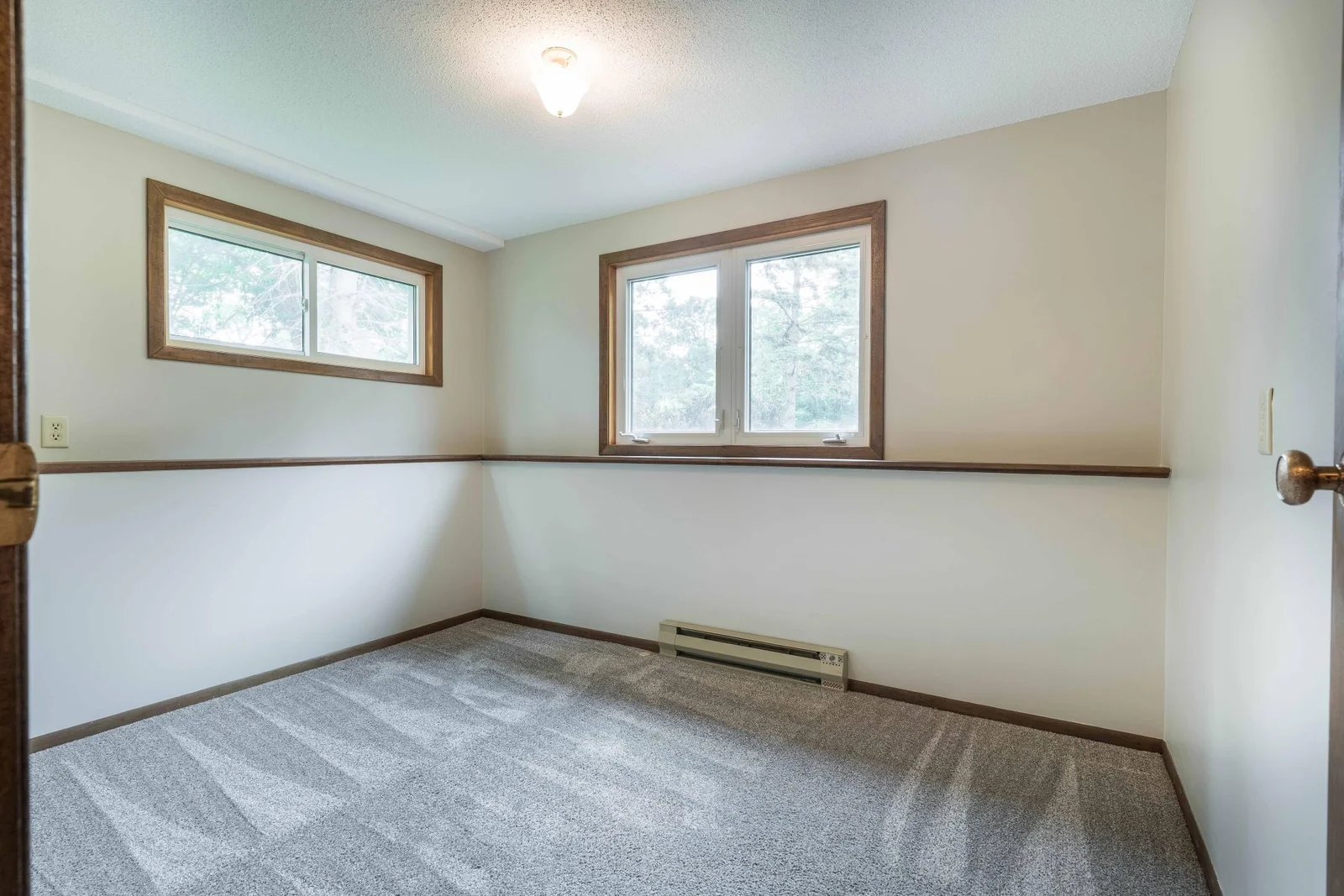 Lower level den with egress window