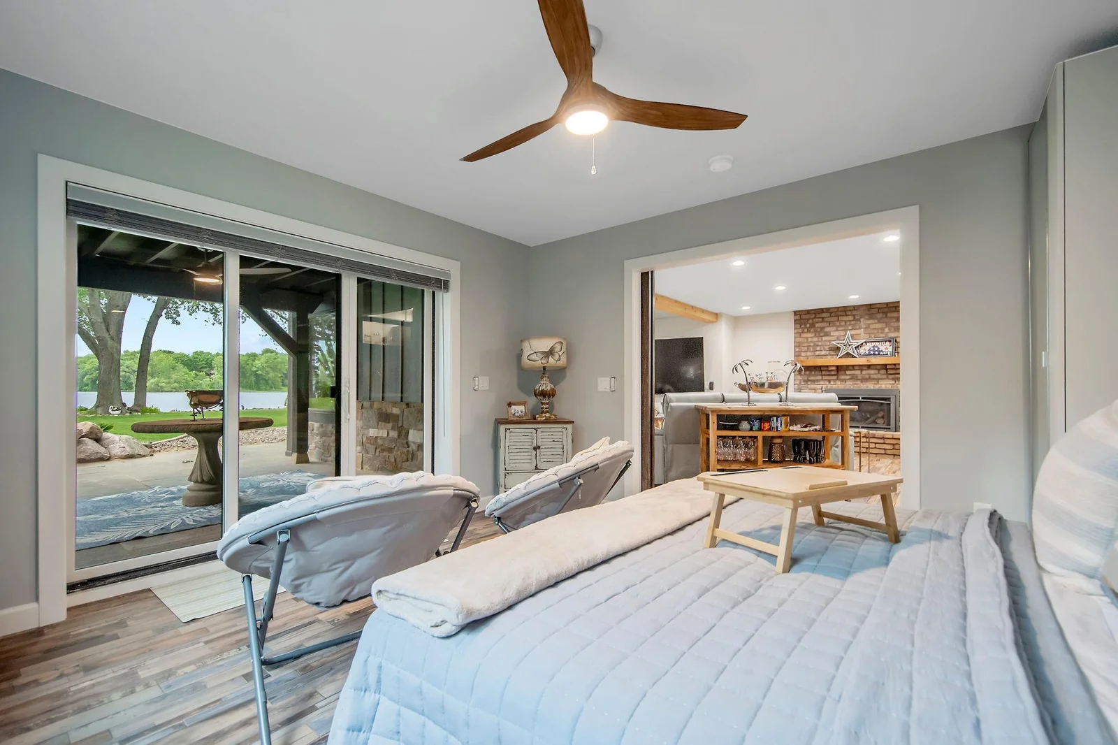 Third bedroom walks out to its own private 22' X 13' covered patio with ceiling fan.  This room can be flex space and would make a great billiard/game room or extension of the family room if wanted.