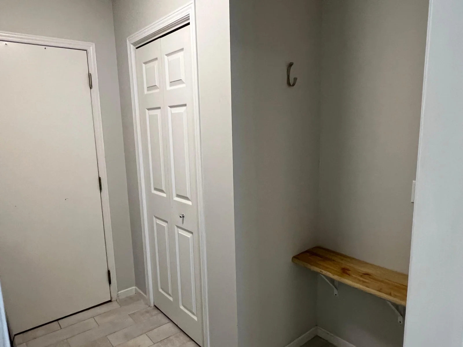 THE CLOSET IS PERFECT FOR ALL YOUR OUTERWEAR, THE BENCH IS CONVENIENT TO SIT ON WHEN DEALING WITH FOOTWEAR.