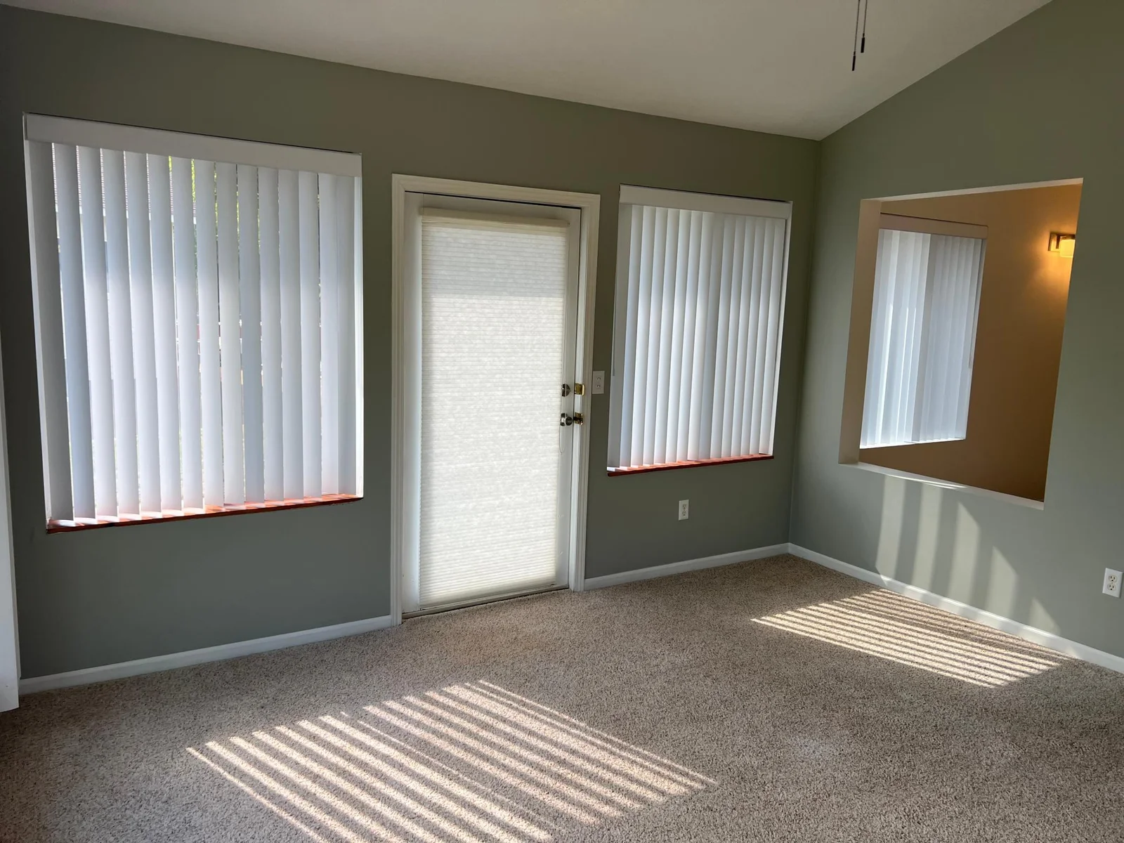 ANOTHER VIEW OF THE SUNROOM.
