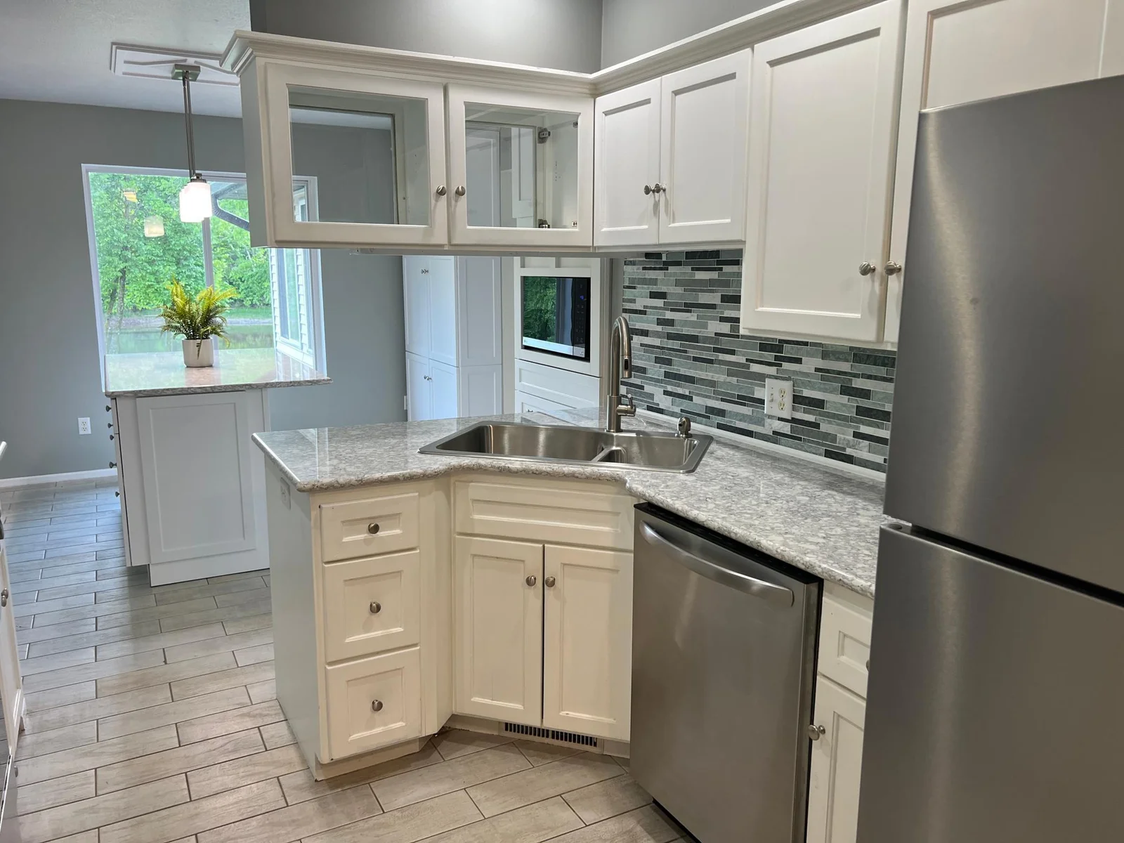 ANOTHER VIEW OF THE SINK ELEVATION FROM A DIFFERENT PERSPECTIVE.
