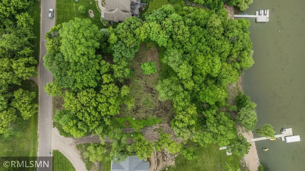 Some trees have been cleared for future home and staked for future septic.