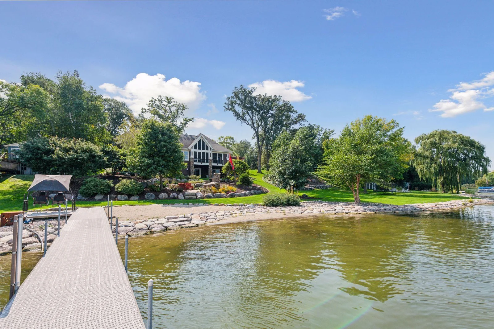 The owners installed power by the lake and a few boulder steps from the beach to the lake