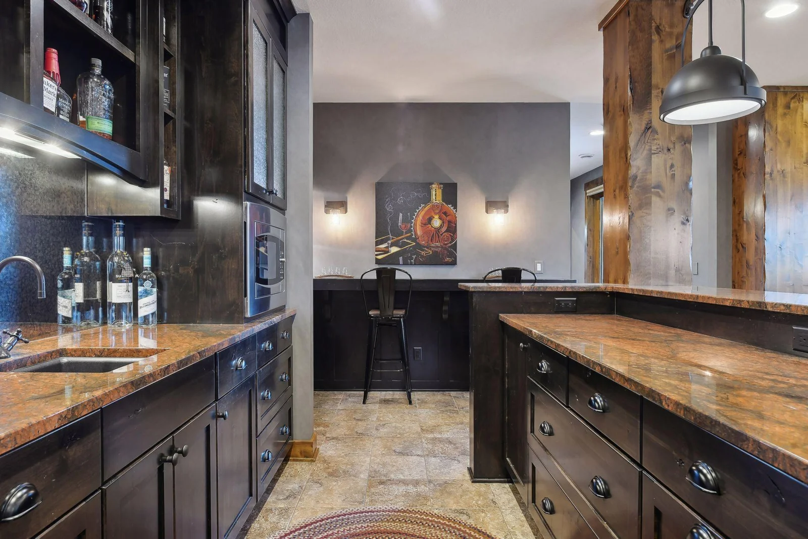There's also a microwave, refrigerator and extensive cabinetry.