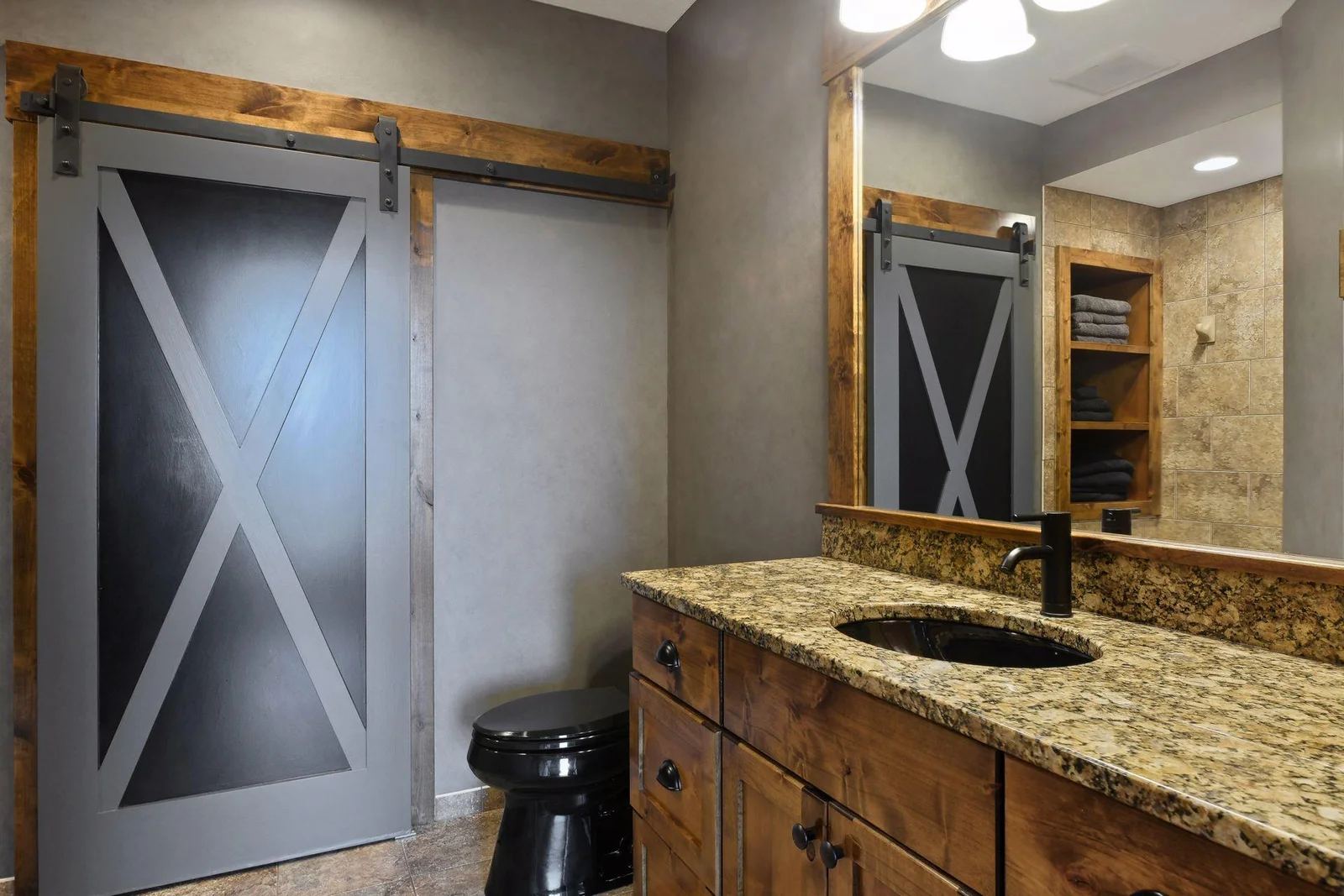 You will find a 3/4 tiled bath with comfort height granite counters for guest use - and in a perfect location for coming off the lake.