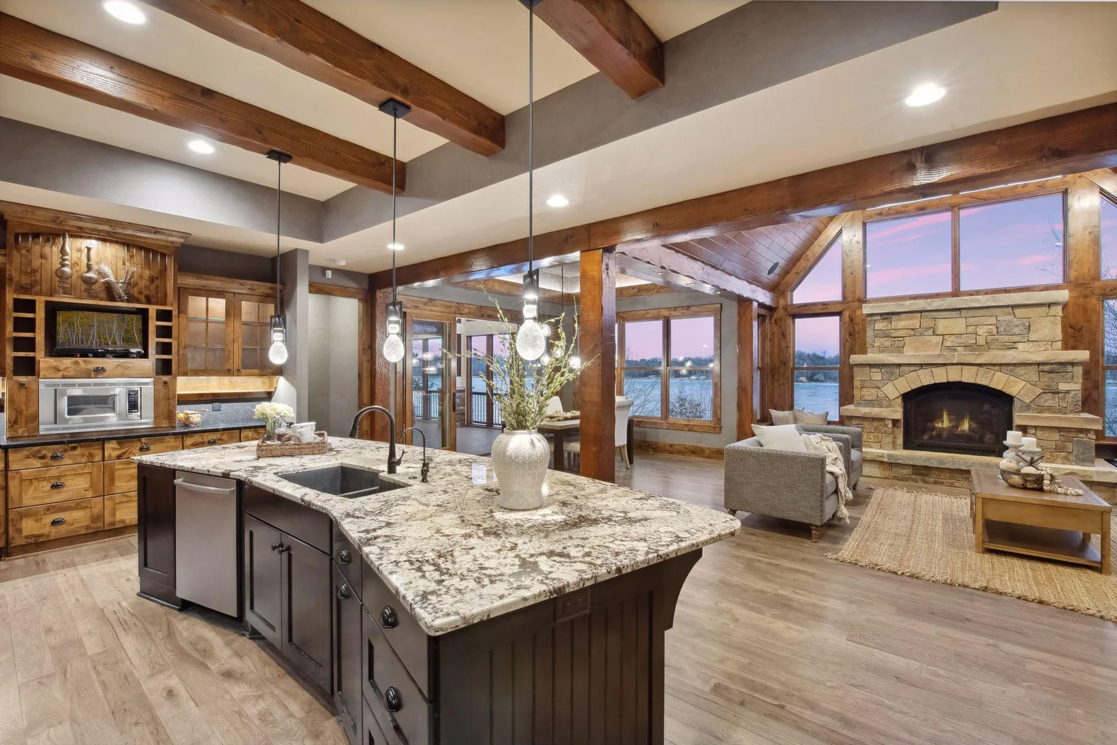 Offering a true Great Room floor plan with hand scraped hardwood hickory floors flow throughout the main floor.