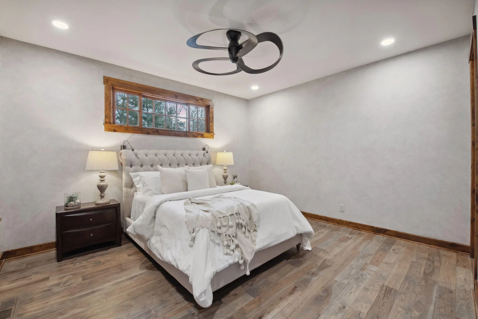 The Primary Suite is on the main level and has extra insulation between floors for a quiet night's sleep.