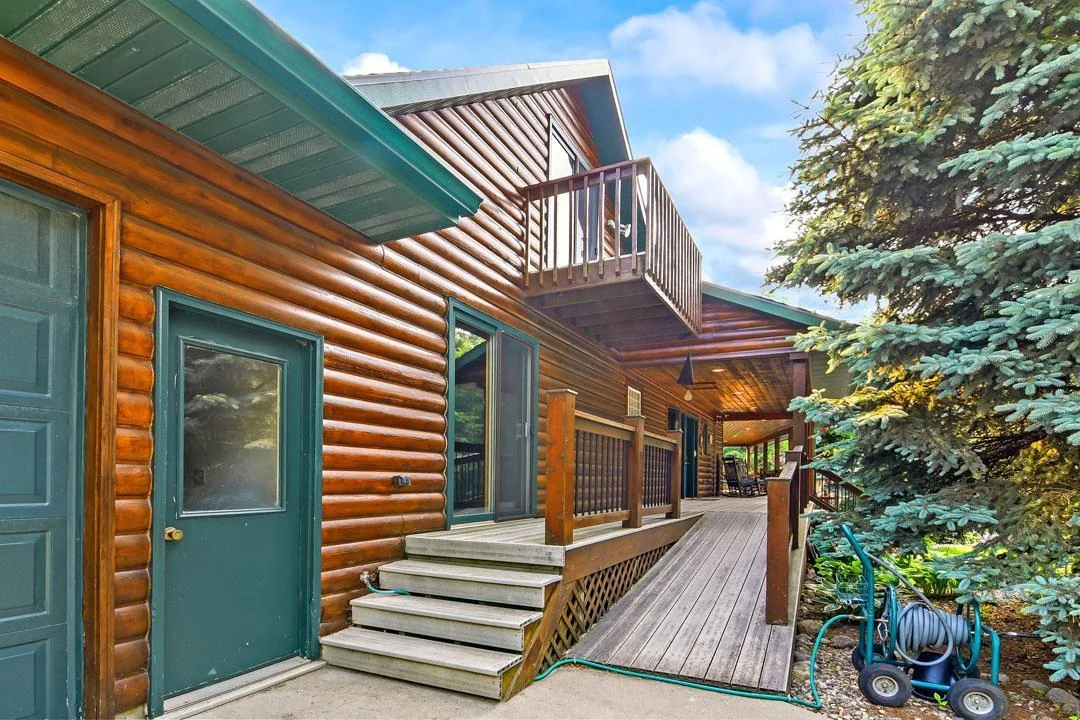 7458 39th Ave, Garfield, MN  Multiple entry options, well maintained decks and surroundings