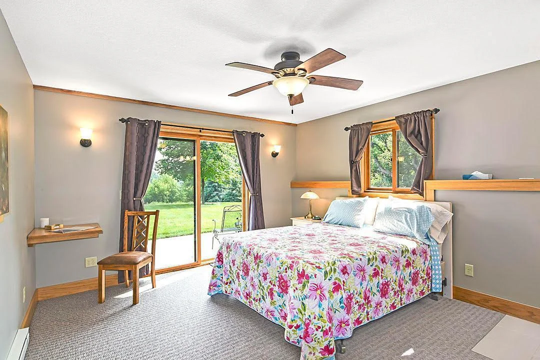 7458 39th Ave NW, Garfield, MN  Bedroom #7 again this offers a private 3/4 bath and a walk out to the patio and rear yard offering peaceful views of the landscape.