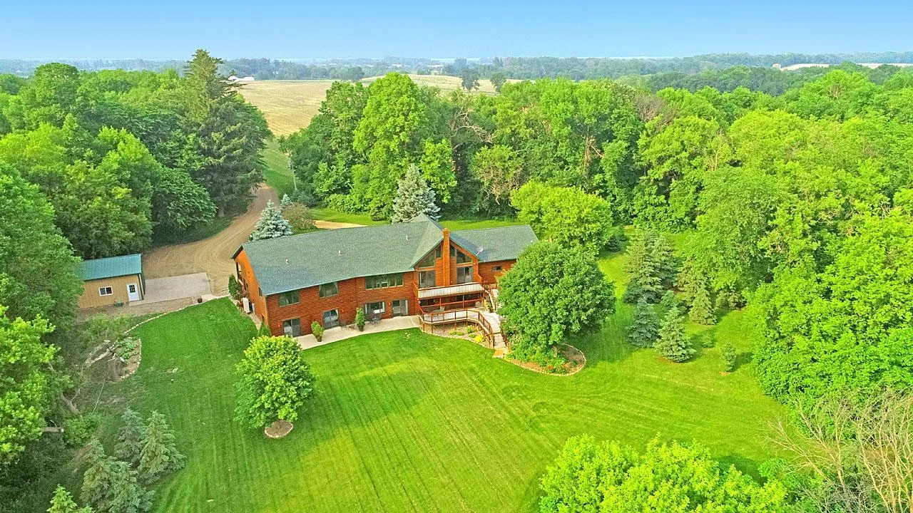 7458 39th Ave NE Garfield, MN  one could describe it as a peaceful retreat nestled in nature—this aerial shot beautifully captures the charm of country living.