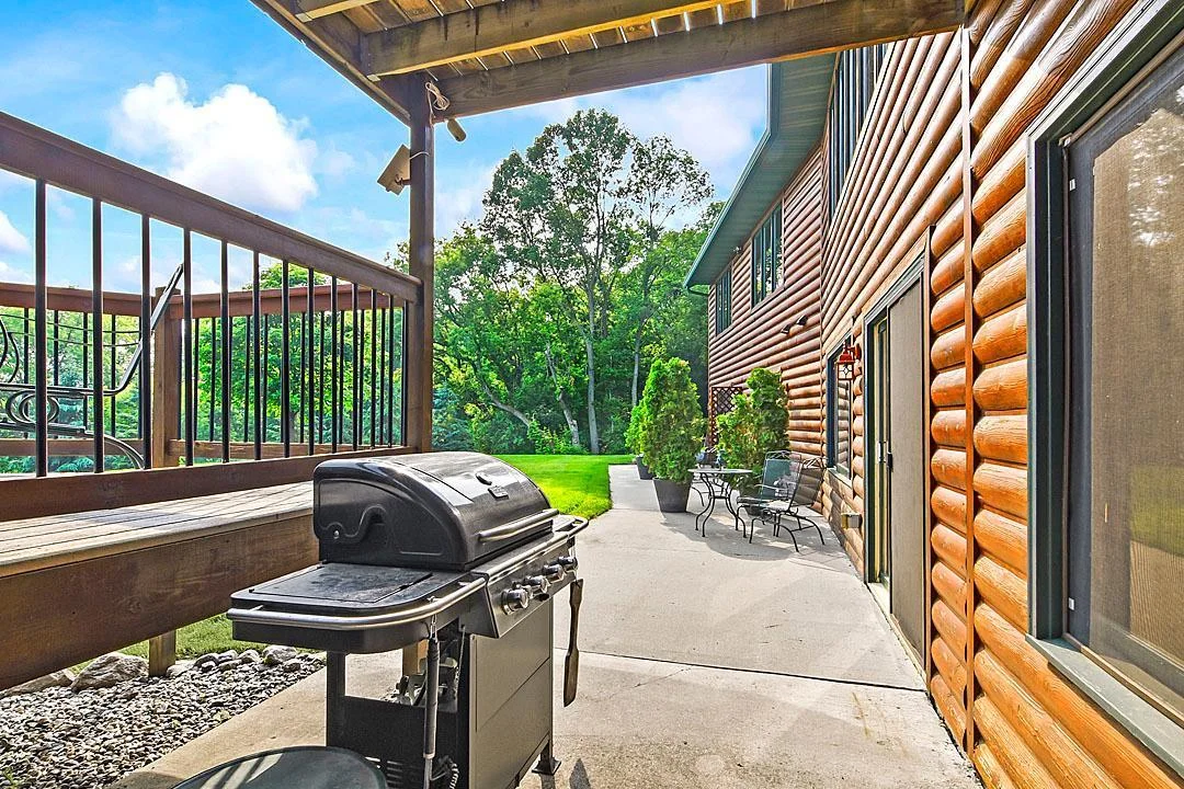 7458 39th Ave NW, Garfield, MN  Patio off the 2nd living area. Great for entertaining,