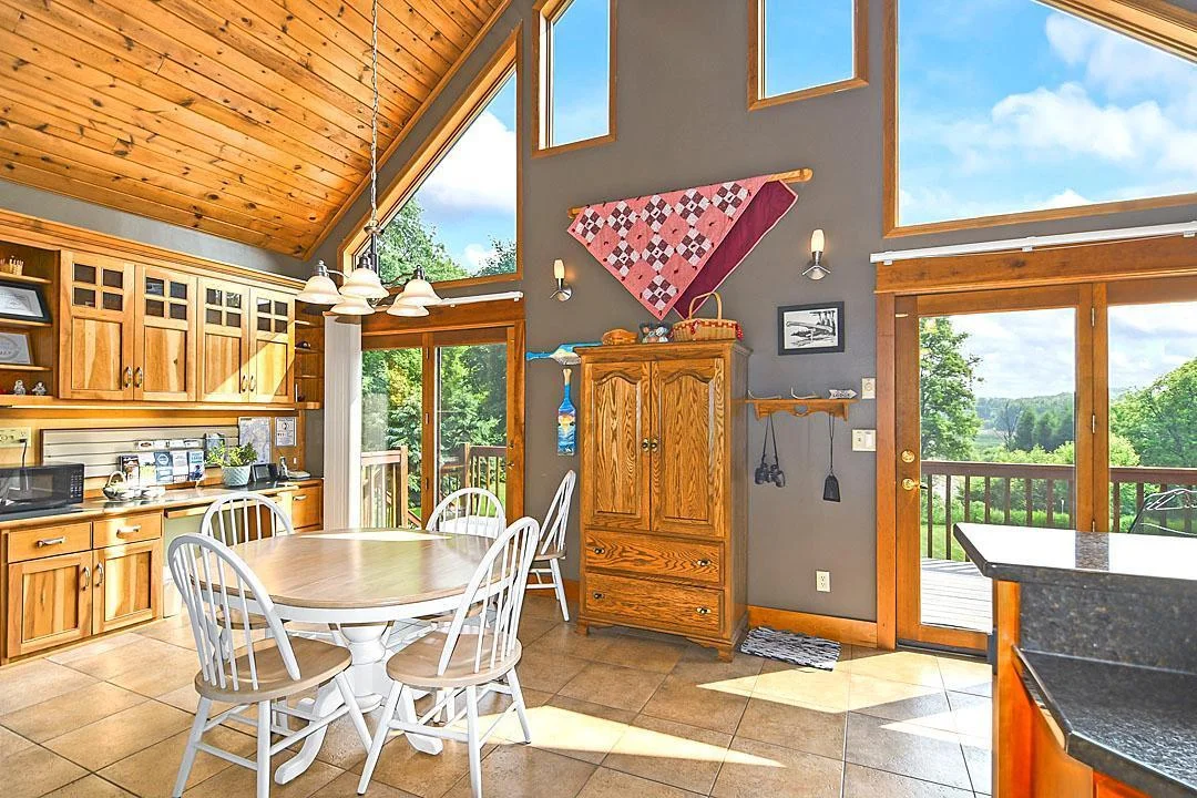 7458 39th Ave, Garfield, MN  Main kitchen is well thought out and offers an open concept, stainless steel appliances, granite countertops, and windows that bring the outside in.