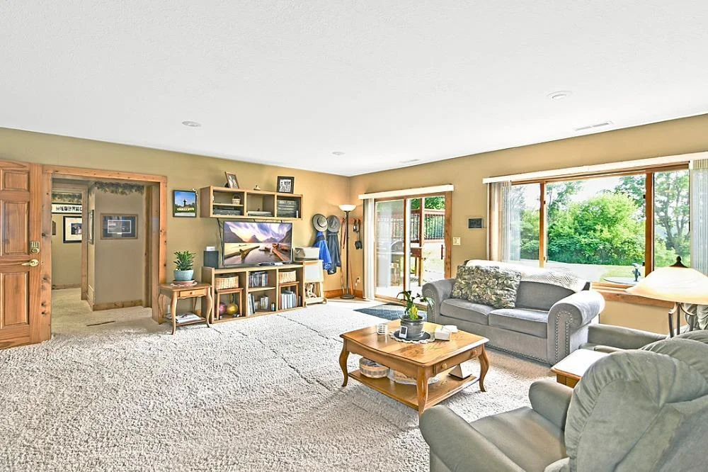 7458 39th Ave NE, Garfield, MN  Patio level offers an additional living space, with 2 bedrooms, bath, kitchen, laundry and walks out to the rear yard