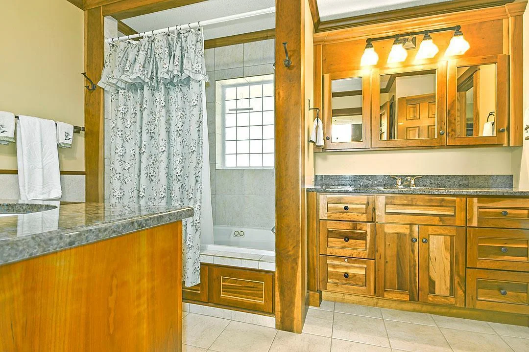 7458 39th Ave NE Garfield, MN  Main floor ensuite with whirlpool tub and dual vanities, beautiful cabinets and granite counter tops