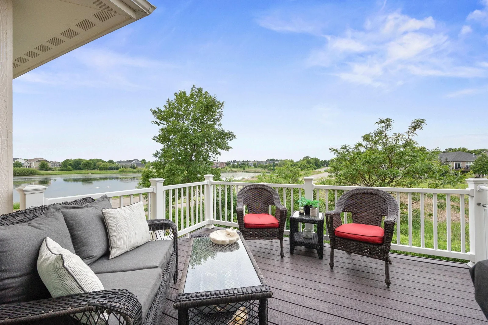 You will love spending time relaxing on your large maintenance free deck surrounded by nature and waterscapes-complete with retractable awning for additional shade