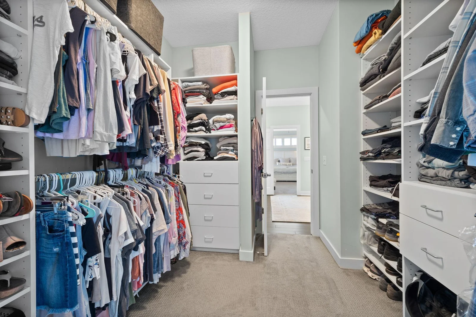 Primary walk thru closet conveniently accesses the laundry room