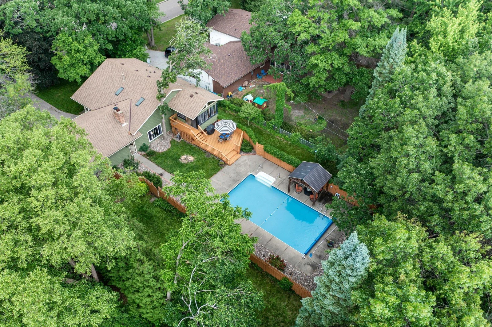 Chain-link fence with gates around back perimeter of lot