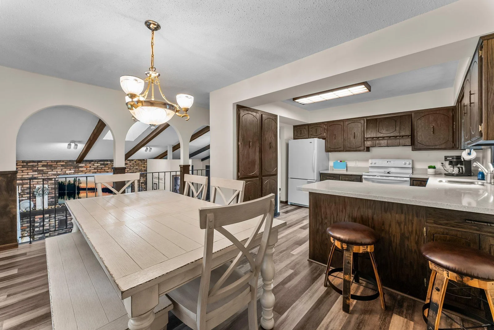Breakfast bar; quartz counters; pantry cabinet