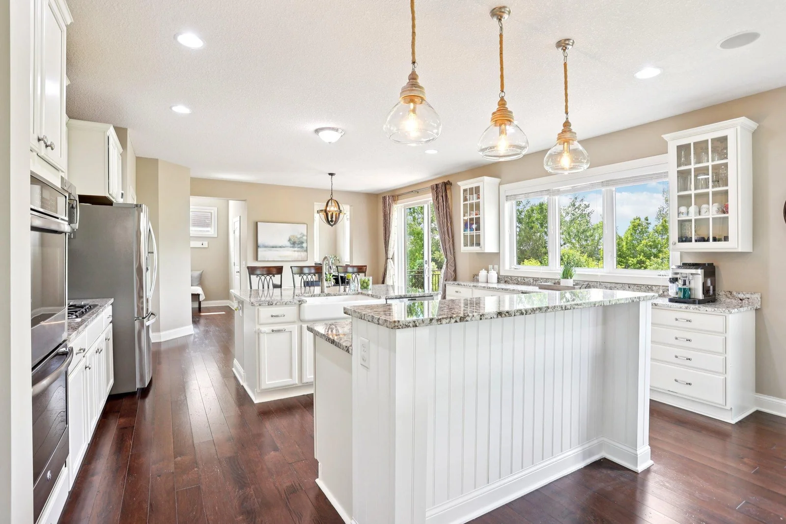 Gleaming hardwood floors and updated light fixtures throughout.