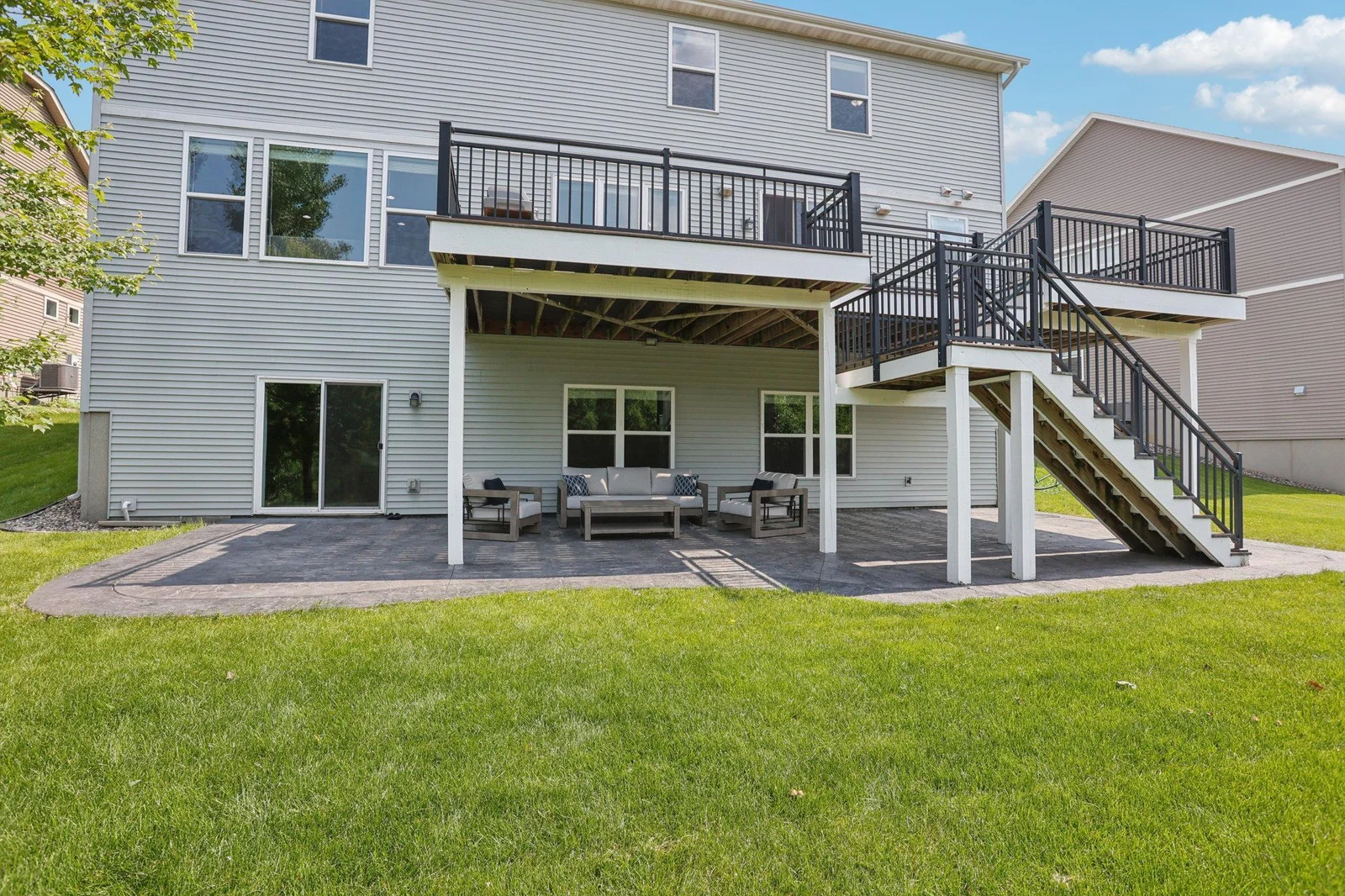 This home features a spacious walk-out lower level and an expansive upper-level deck.