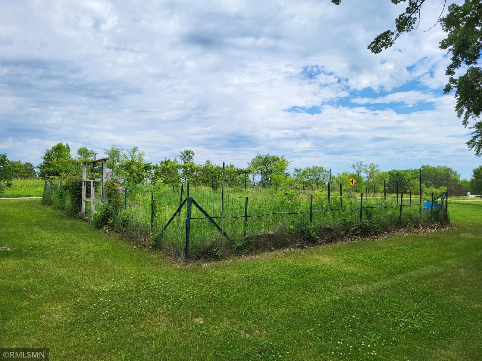 Lovely fenced in garden with irrigation.