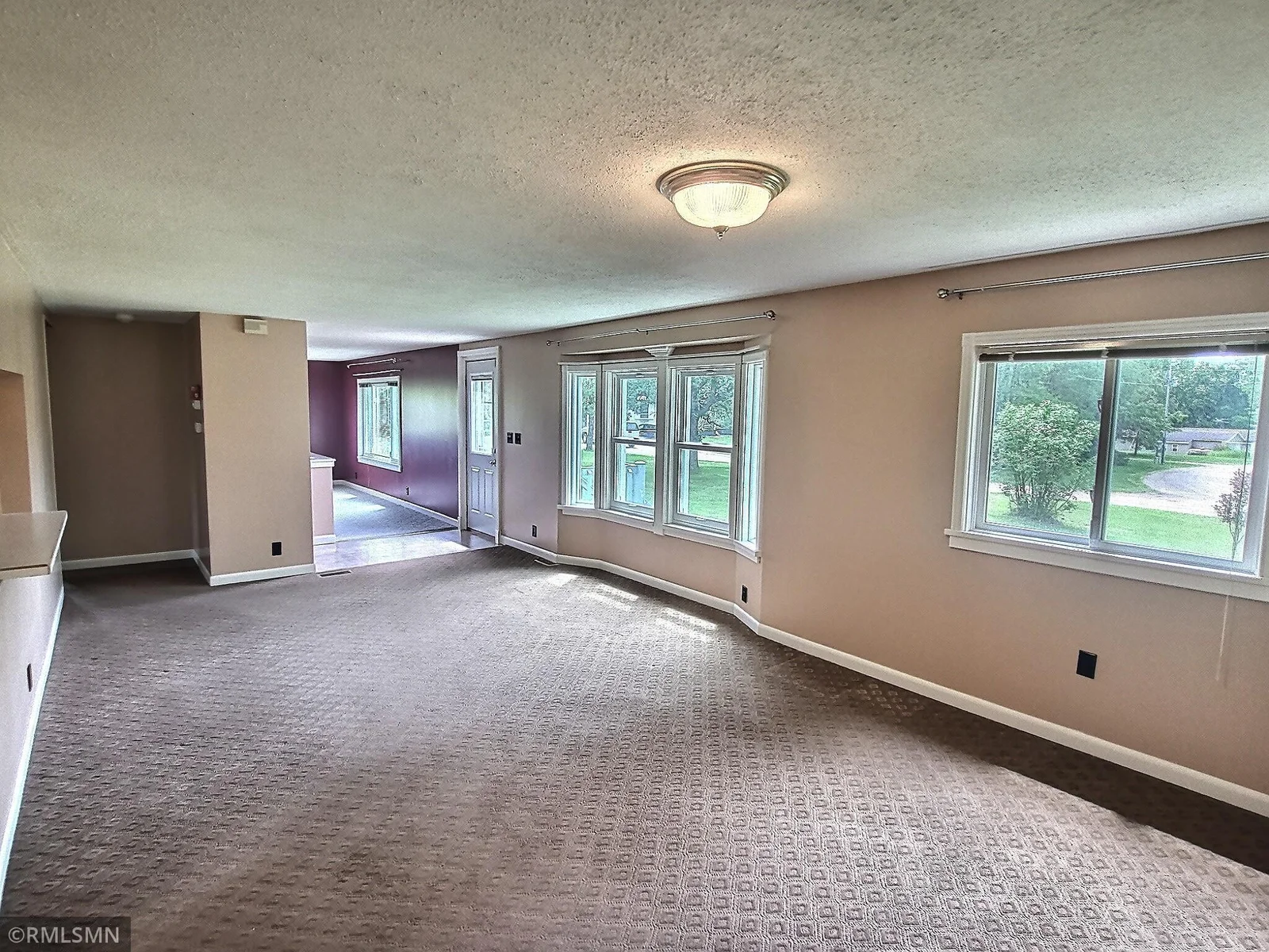 Here is another view of the spacious living room. Great space for entertaining or relaxing taking in the views.