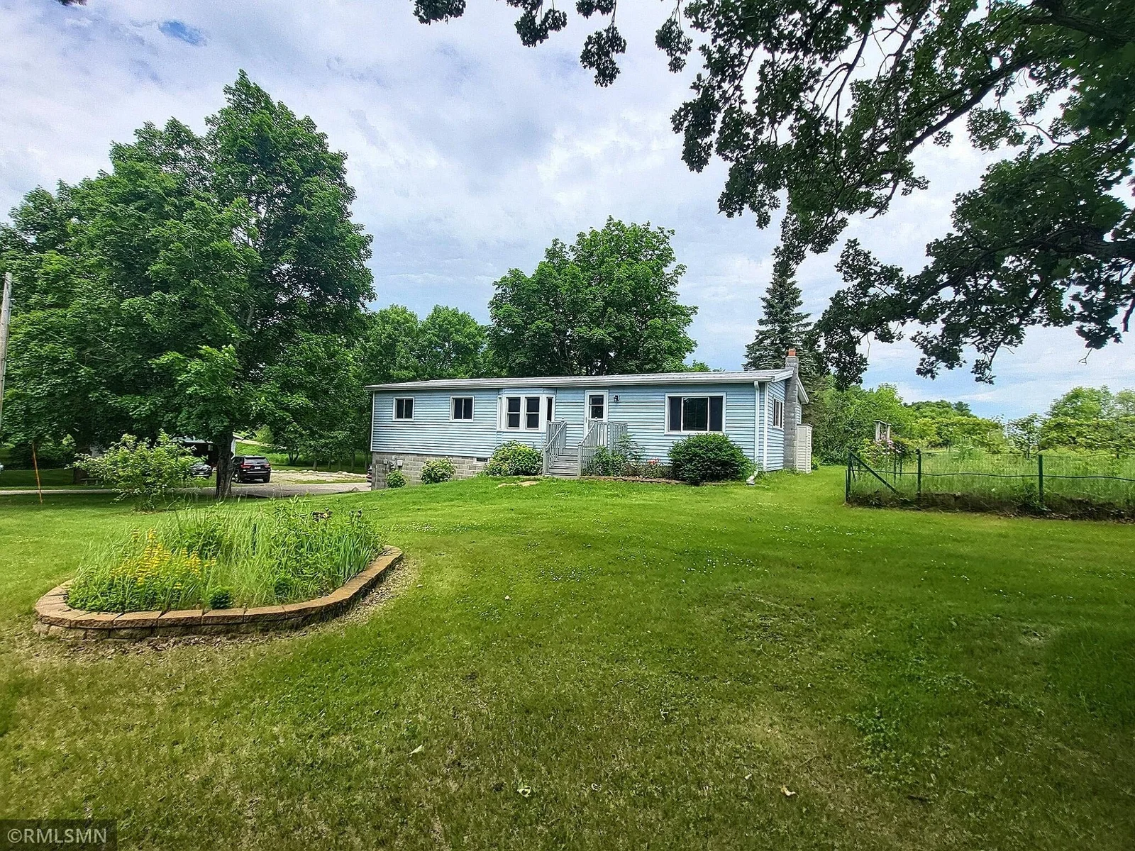 The .74 acre lot is the perfect side for room to spread out, play some lawn games and of course, tend to your garden!