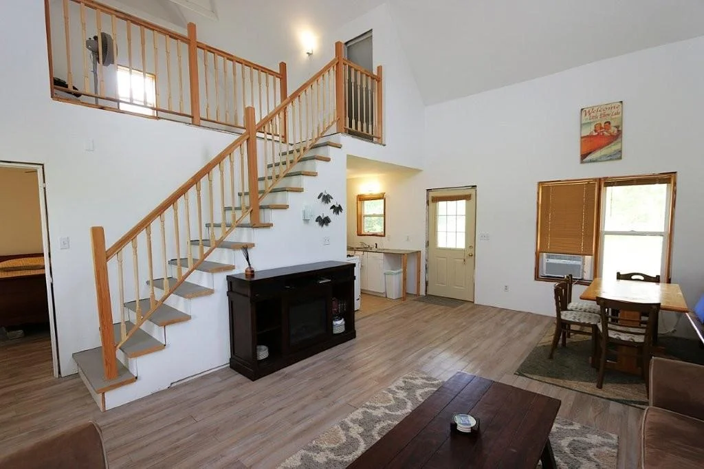 Living area with stair to loft.jpg