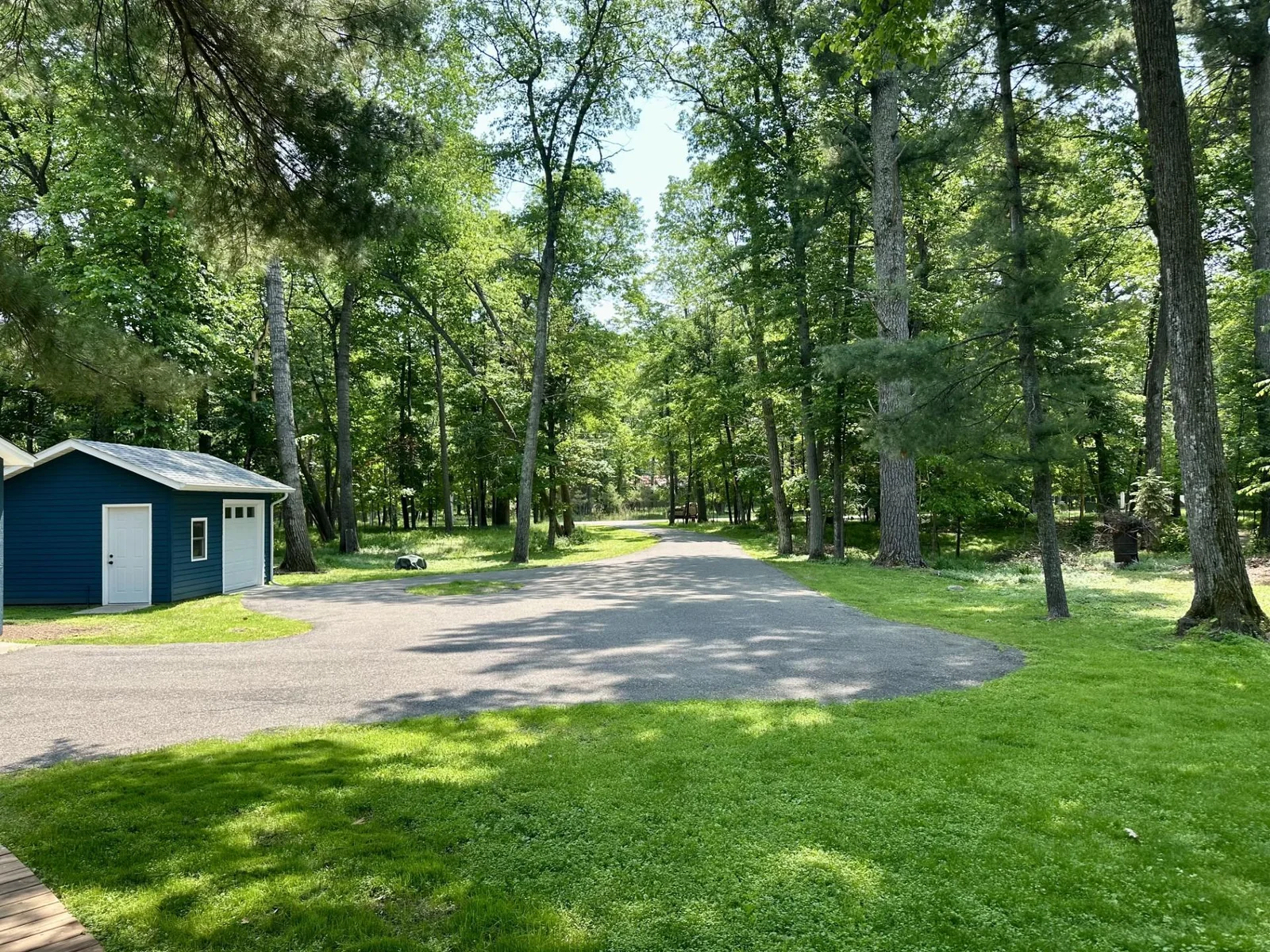 Deep asphalt driveway just off a 3+ mile walking/biking trail!