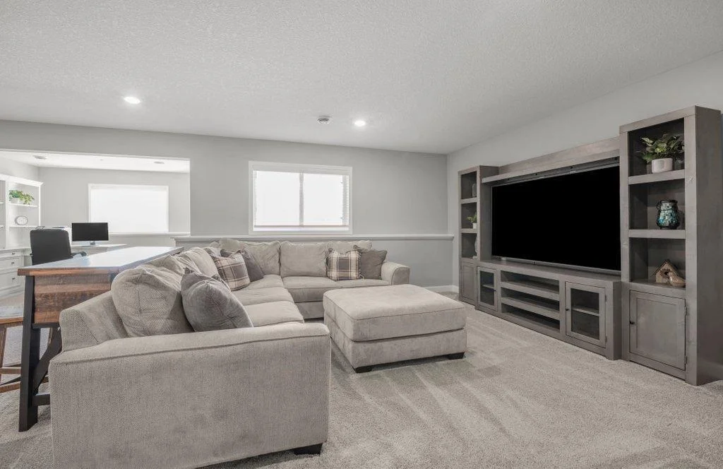 Family Room cabinets don't stay but the TV does!