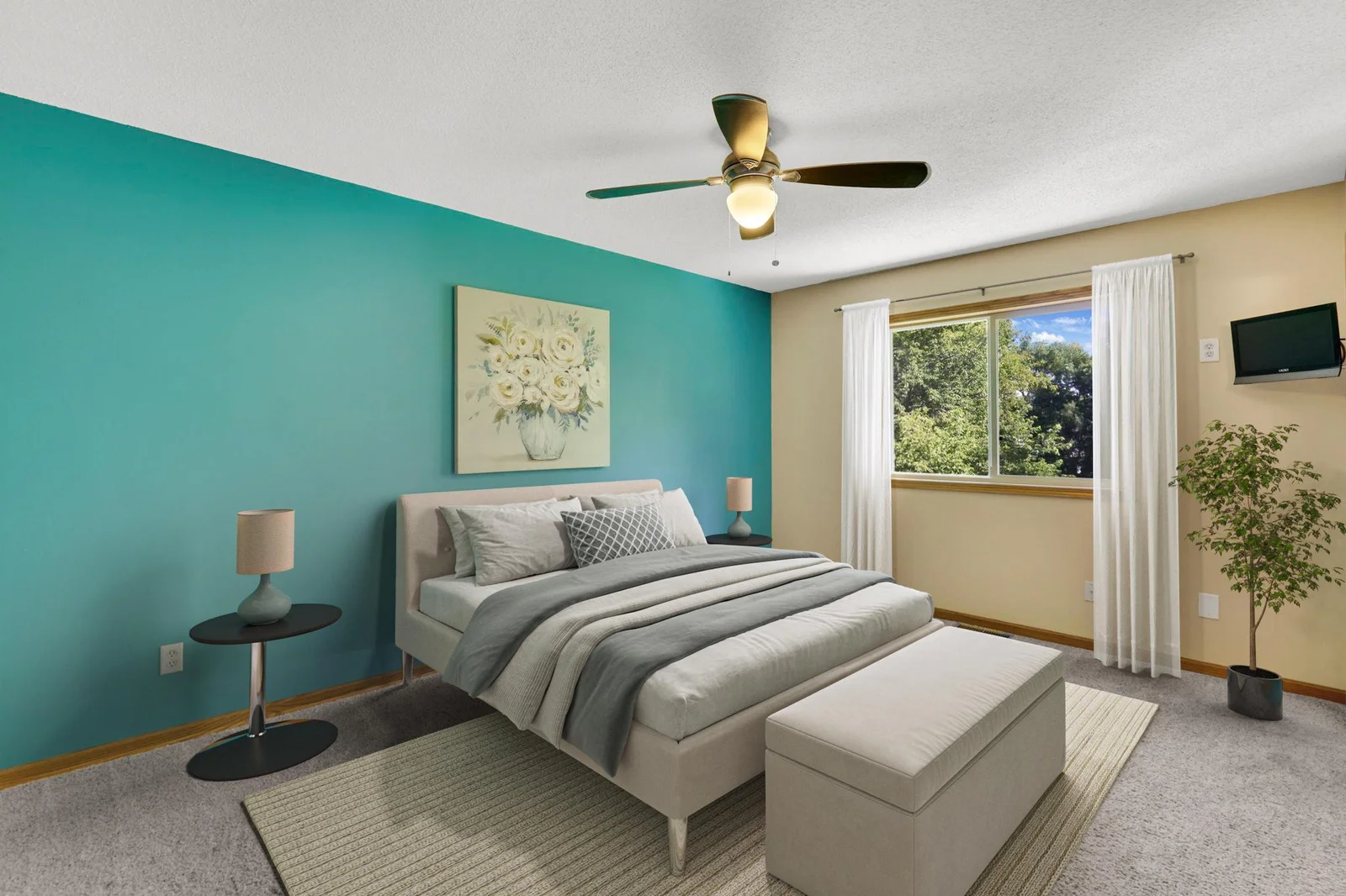 Primary bedroom overlooking mature trees
