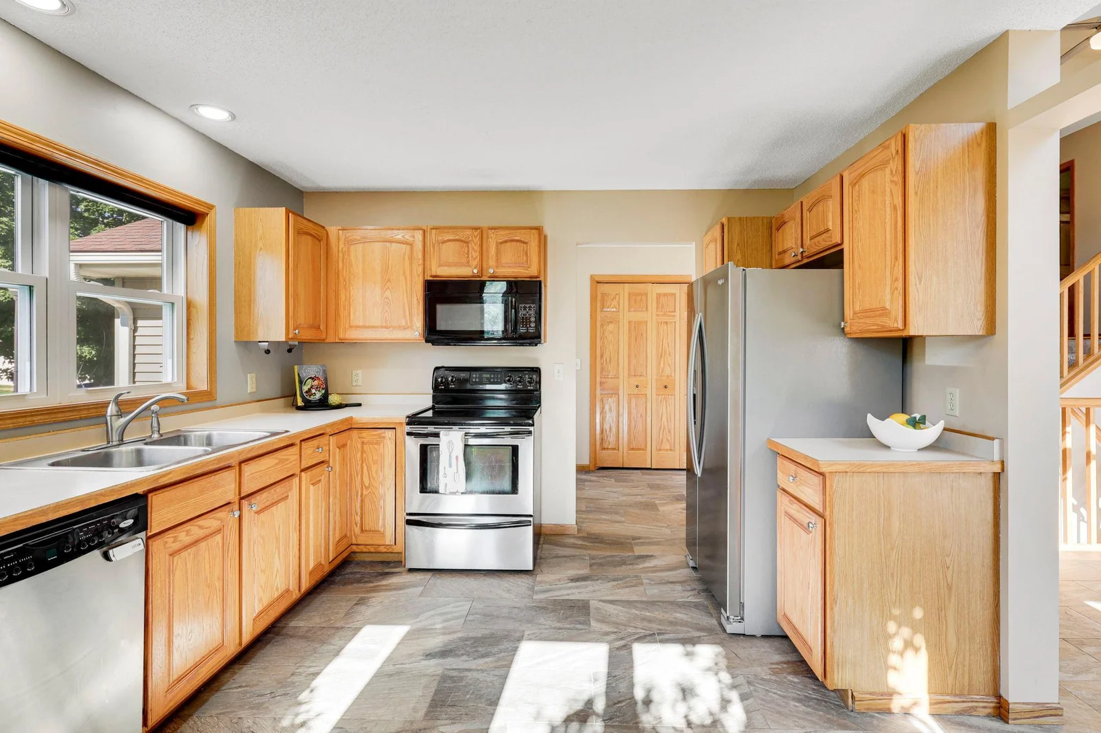 Tons of natural light flood the kitchen