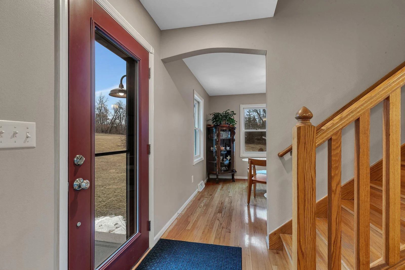 entry to open stairway and Dining to left