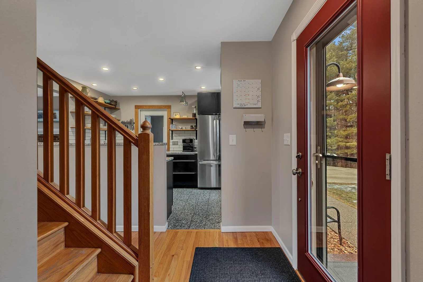 Entry with kitchen to right