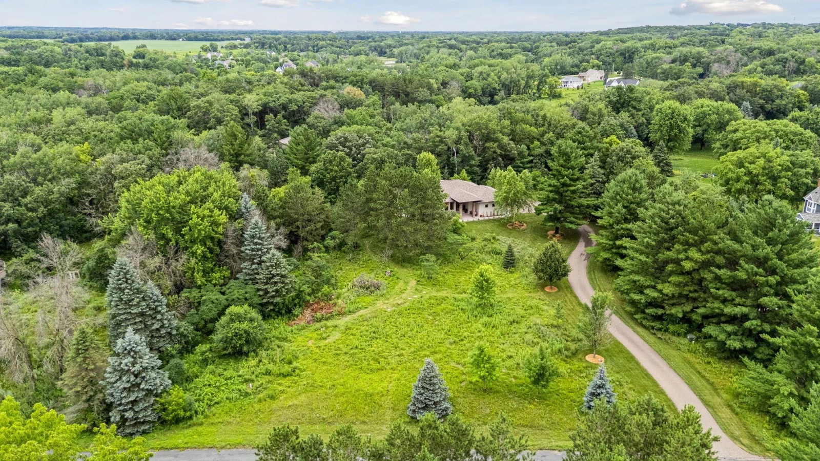 With 2.5 acres to call your own, enjoy privacy, open space, and natural beauty all around.