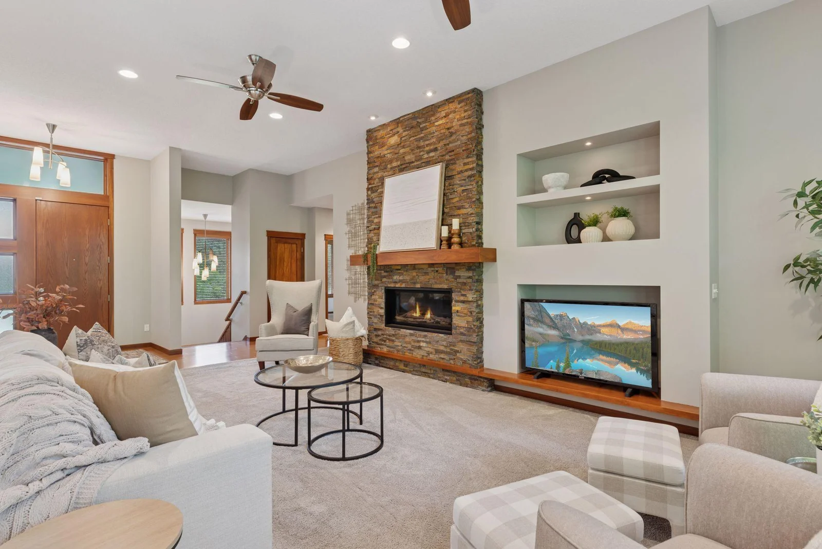 A wide-angle view of the main living room—airy, open, and filled with natural light.