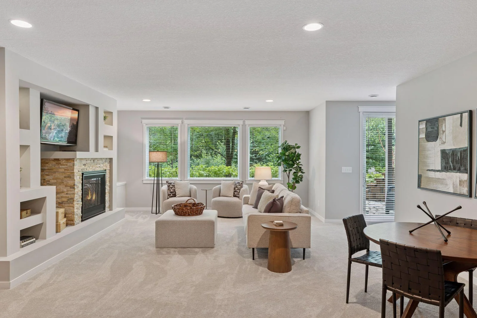 Cozy fireplace in the lower level walkout adds warmth and comfort.